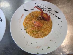 Las Piscinas Balmaseda paella servida